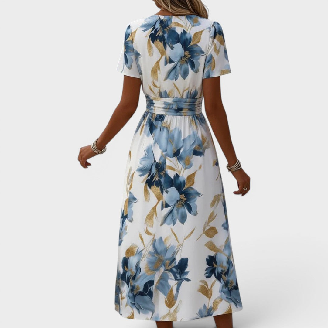 Elara Vestido midi floral con cintura envolvente