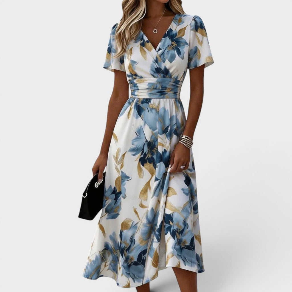Elara Vestido midi floral con cintura envolvente