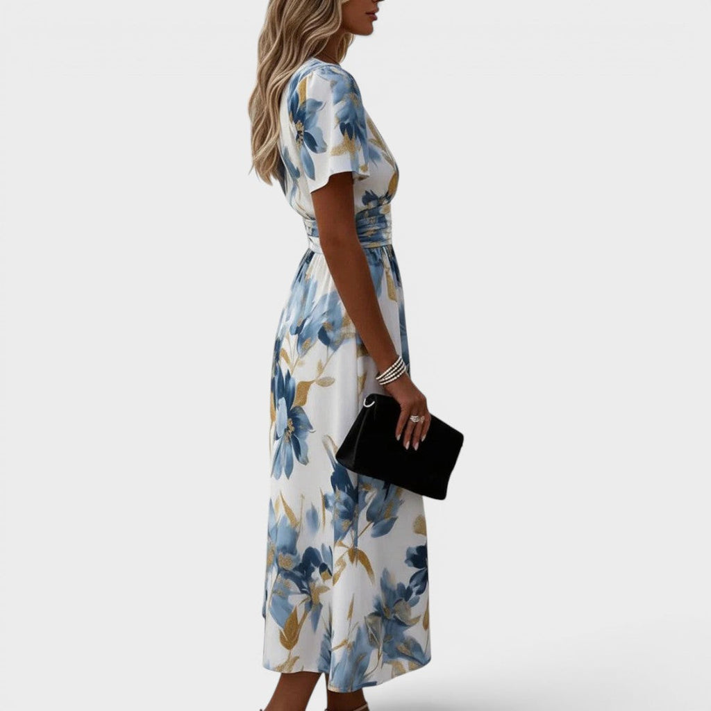 Elara Vestido midi floral con cintura envolvente