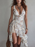 Vestido mini con estampado floral retro, escote en V y tirantes finos.