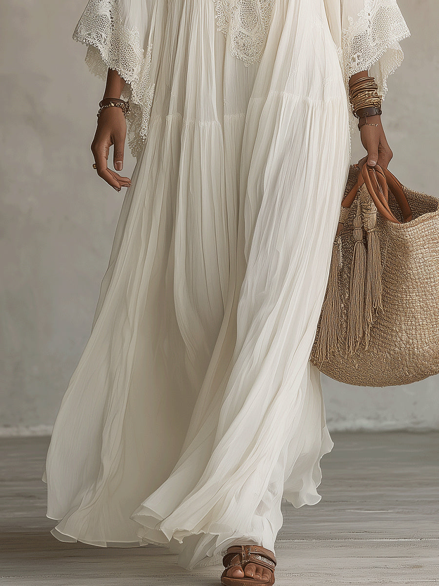 Elegante vestido maxi de chiffon blanco con encaje, escote en V y manga murciélago